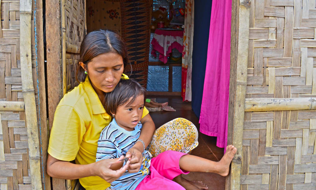 Jennifer Vasquez in her transitional house in Tacloban City.