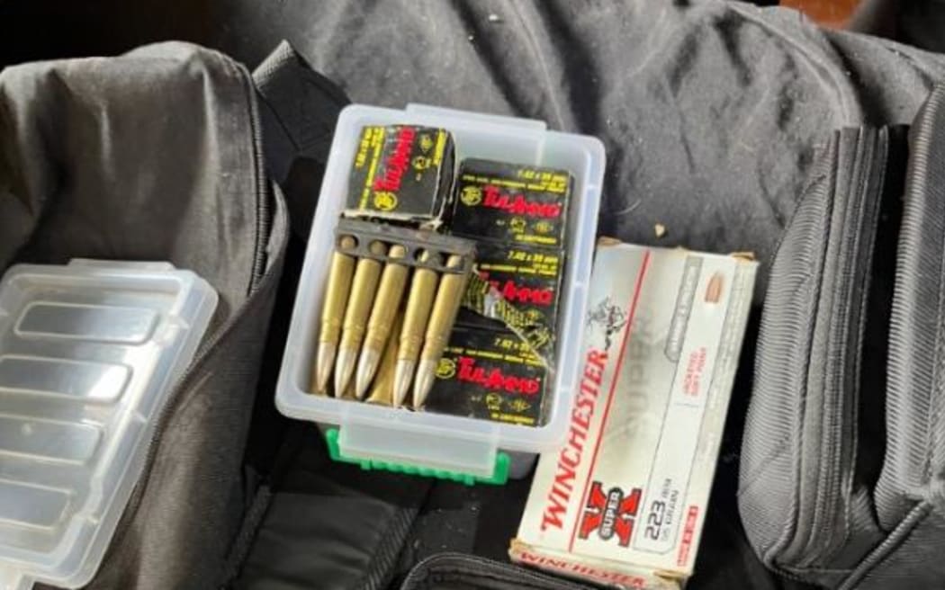 Guns and ammunition seized by police in Glendene.