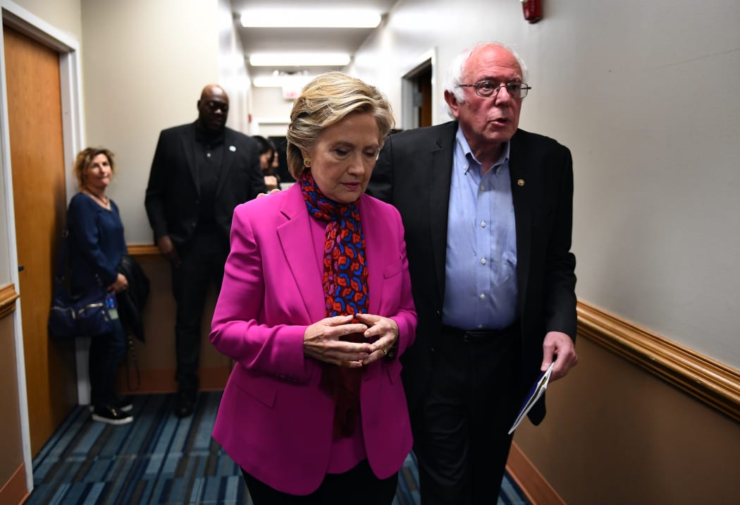 Hillary Clinton and Bernie Sanders before a campaign rally in Raleigh, North Carolina on 3 November 2016.