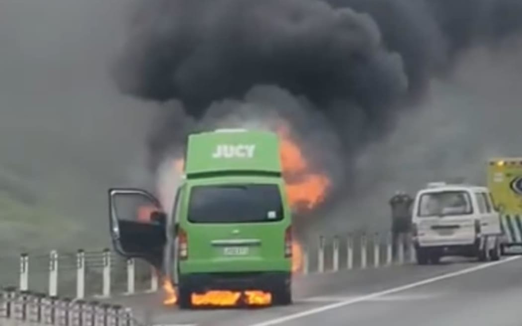 Jucy rental van on fire.