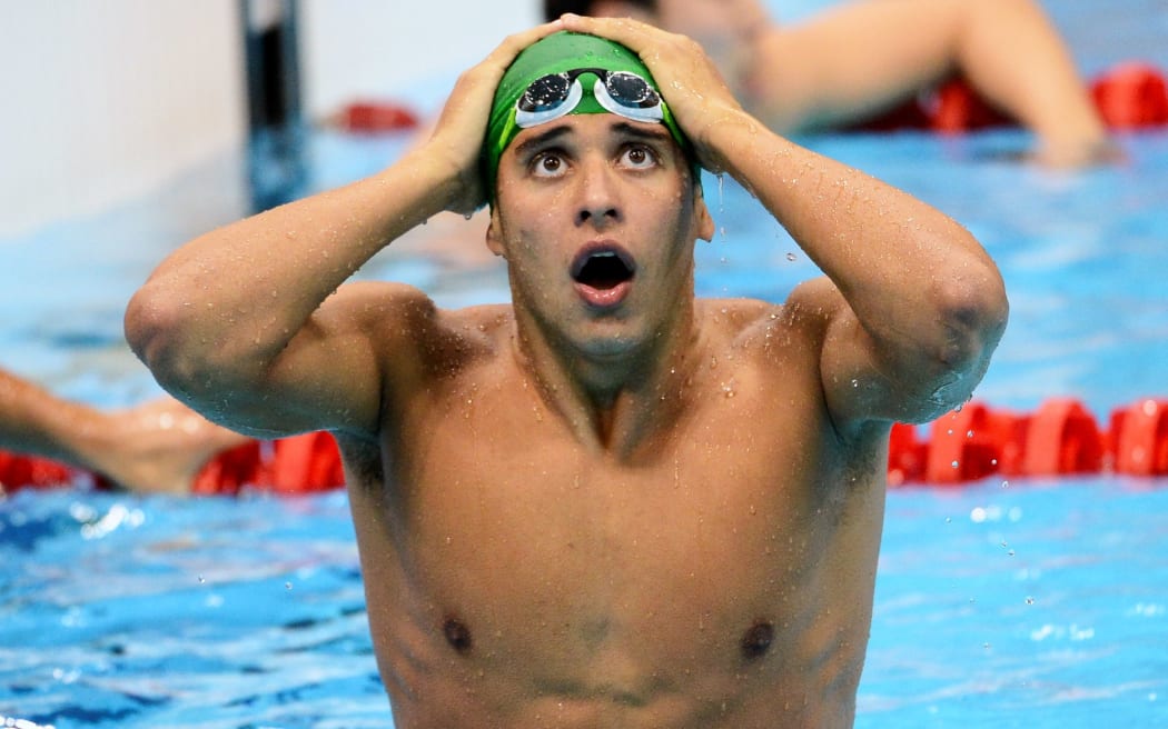 Chad le Clos wins Olympic gold in the 200m butterfly, 2012.