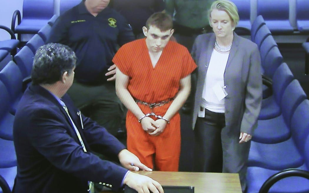 Nikolas Cruz appears in court charged with 17 counts of murder.