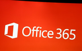 The logo of Microsoft Office 365 is seen on a screen. (Photo by Alexander Pohl/NurPhoto)