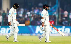 Rachin Ravindra and Ajaz Patel walk off after test draw against India 2021.