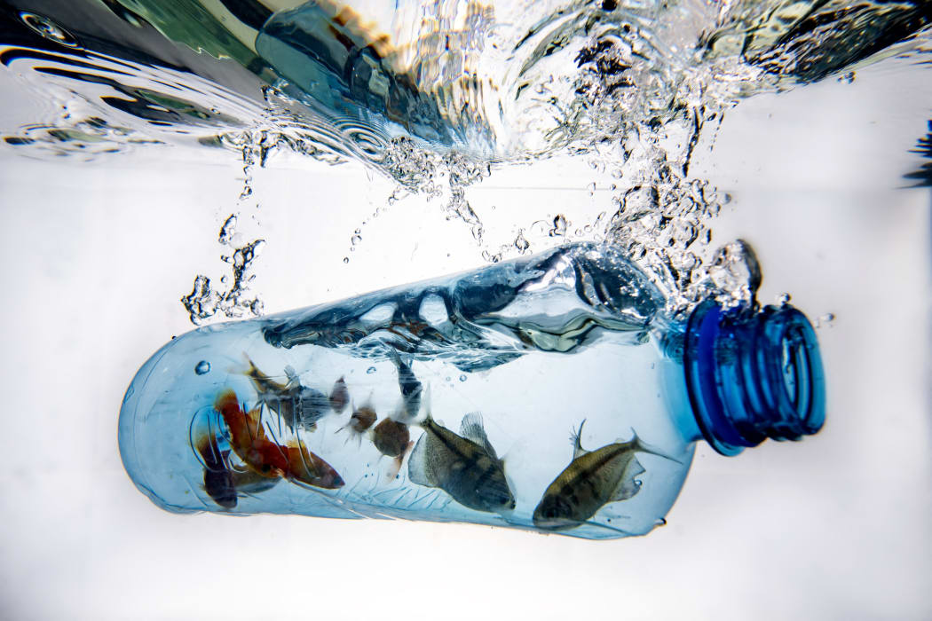 A photo taken on December 8, 2022, in Vaasa, shows plastic pieces in frozen water. Negotiations on a global treaty to combat plastic pollution will resume Monday, with nations under pressure to stem the tide of trash amid calls from campaigners to limit industry influence on the talks.

Some 175 nations pledged last year to agree by 2024 a binding deal to end the pollution from largely fossil fuel-based plastics that is choking the environment and infiltrating the bodies of humans and animals.

The May 29-June 2 talks in Paris are tasked with agreeing the first outline for actions that could form the basis of a draft negotiating text. (Photo by Olivier MORIN / AFP)