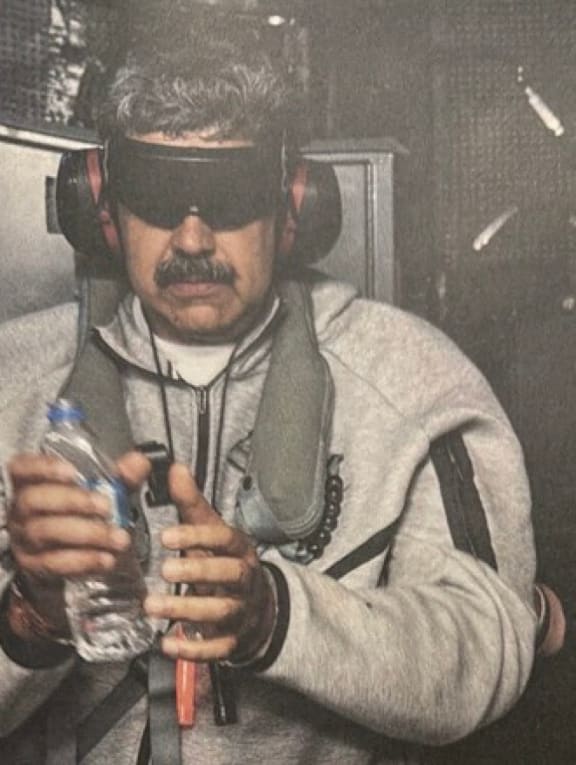 This image was posted on US President Donald Trump's Truth Social account on 3 January 2026, showing Venezuela's President Nicolás Maduro onboard the USS Iwo Jima after the US military kidnapped him