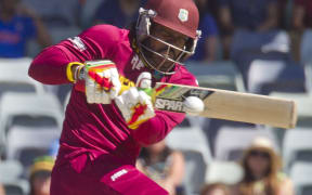 West Indies batsman Chris Gayle plays a shot during the 2015 Cricket World Cup Pool B match between the West Indies and India in Perth.