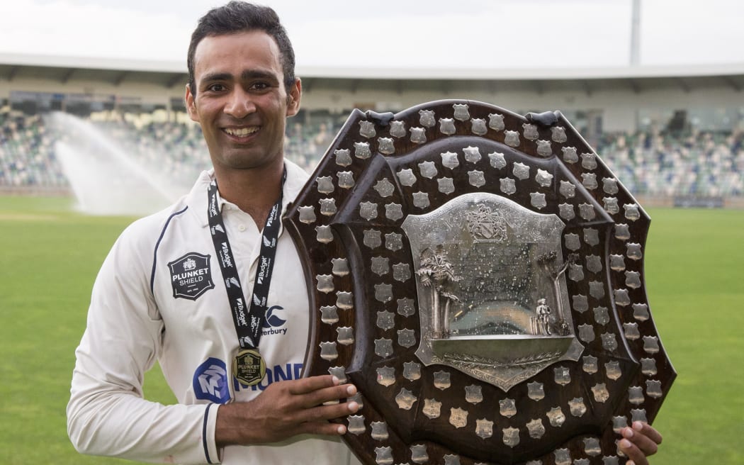 Auckland batsman Jeet Raval with the Plunket Shield.