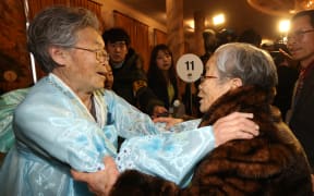 Kim Seok-Ryo (left) of North Korea, who's 80, is reunited with her sister Kim Song-Yun, 96, of South Korea.