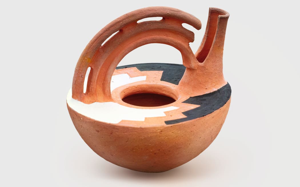 Baye Riddell's Ipu Wai c.1985. The handle was inspired by he tauihu- the prow of a waka