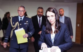 Prime Minister Jacinda Ardern,  Chief of Defence Force Air Marshal Kevin Short and Defence Minister Peeni Henare prepare to speak to media after a Cabinet meeting about supporting people in Afghanistan.