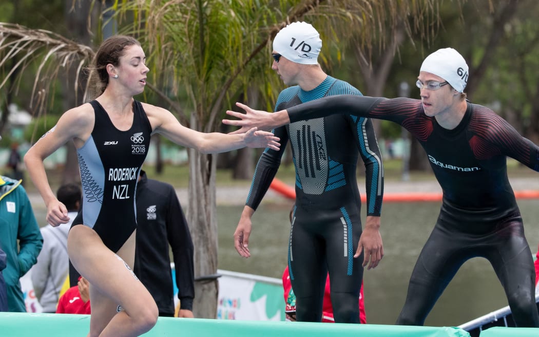 Brea Roderick NZL tags Joshua Ferris AUS during the Triathlon Mixed Relay Continental Team Event at 2018 Youth Olympics, Buenos Aires.