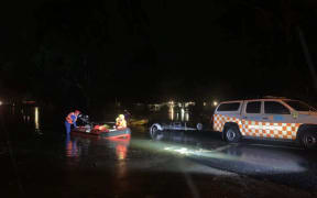 New South Wales state emergency service teams rescued three people, along with 25 dogs and four sheep, from floodwaters in Londonderry, western Sydney.