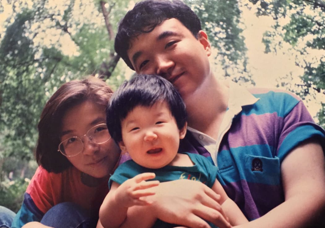 Hye Ji 'Erica' Lee as a child with her parents.