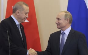 Russian President Vladimir Putin (R) and his Turkish counterpart Recep Tayyip Erdogan shake hands during a joint press conference following their talks in the Black sea resort of Sochi.