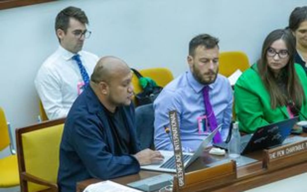 Joey Tau of PANG (L) with members of Greenpeace International and Pacific Blue Line