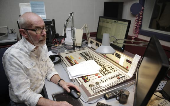 Lloyd in the studio for his final all-night broadcast.