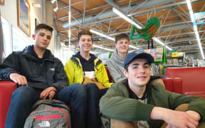 Caleb Stanley-Dwyer (left), Christopher McLellan, Alexander Telfar, and Lawrence White (front) at the Ruth Gotlieb Library in Kilbirnie Wellington.