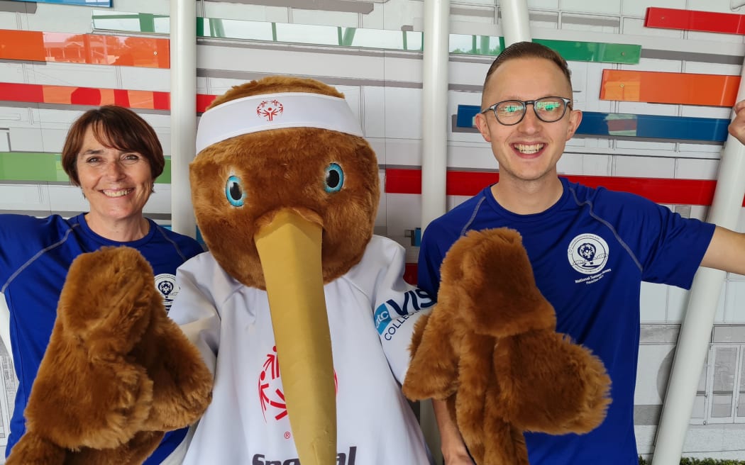 Special Olympics officials and mascot Kieran Booth and Carolyn Young