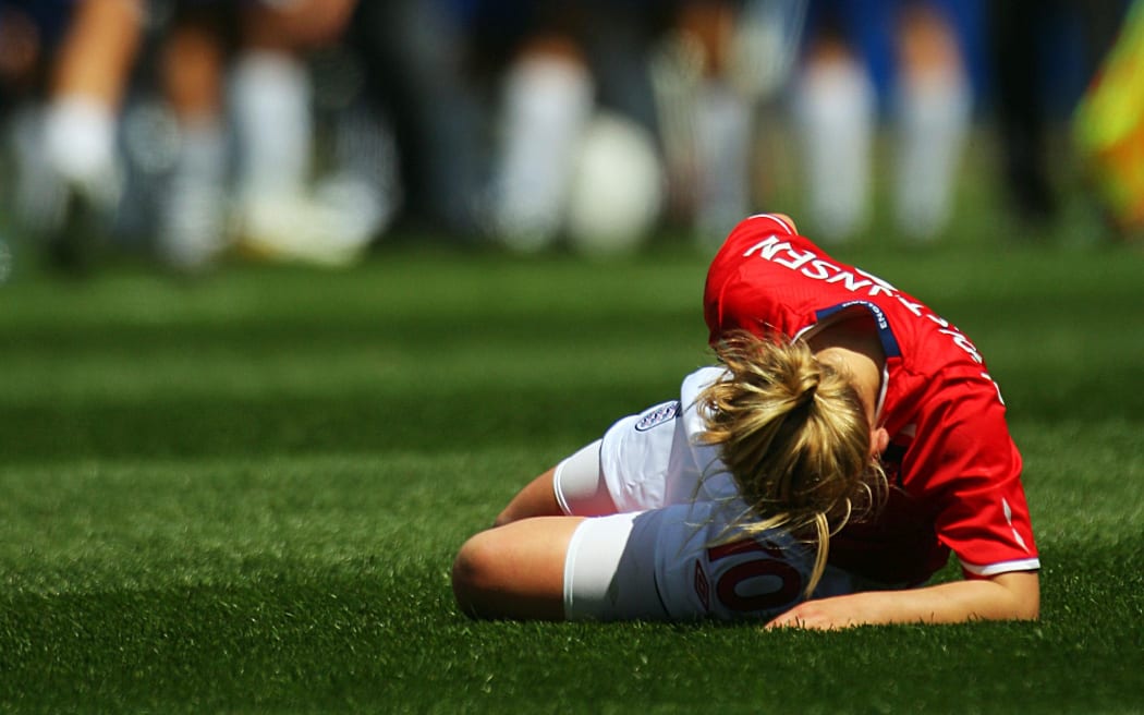 Isobel Christiansen goes down with an injury.