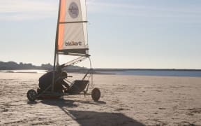 A Blo kart on a beach