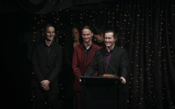 Alien Weaponry (Lewis de Jong, Henry de Jong, and Ethan Trembath) accept the APRA Maioha Award.