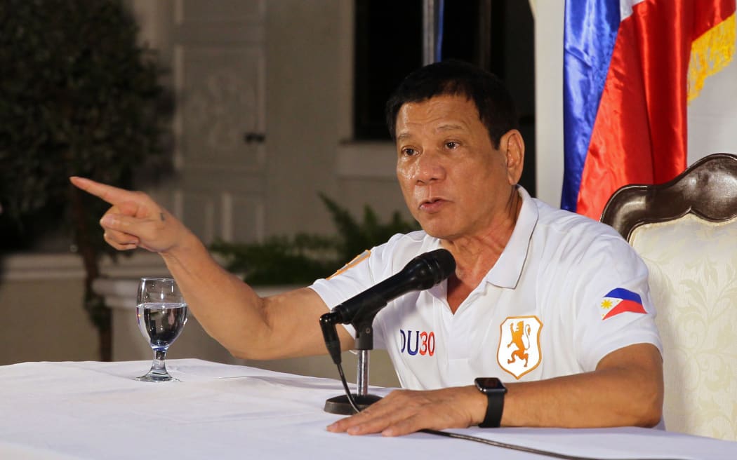 Philippines President Rodrigo R Duterte gestures at a press conference where he threatened to have the country leave the United Nations.