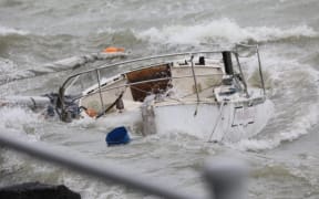 An unmoored yacht in Auckland harbour after wild weather overnight.