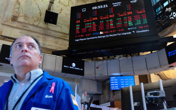 NEW YORK, NEW YORK - APRIL 01: Traders work on the floor of the New York Stock Exchange during morning trading on April 01, 2025 in New York City. Stocks opened up low as the market reacts to tomorrow’s expected proposal by U.S. President Donald Trump for a round of new tariffs on most imports to the United States, which the president has dubbed “Liberation Day.” China, Japan, and South Korea have agreed to respond to U.S. tariffs jointly.   Michael M. Santiago/Getty Images/AFP (Photo by Michael M. Santiago / GETTY IMAGES NORTH AMERICA / Getty Images via AFP)