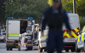 An army bomb disposal unit is parked nearby during a security operation at Springfield Street in Wigan, Greater Manchester.