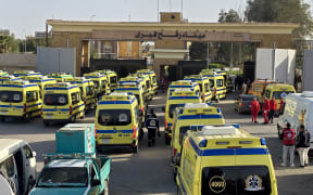 Ambulances and medical teams affiliated with the Egyptian Ministry of Health arrive at the Rafah border crossing on Sunday, standing by to enter Gaza to provide humanitarian aid and medical support if the crossing is opened.