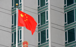 The Chinese flag flies outside the consulate on June 4, 2009 in New York.