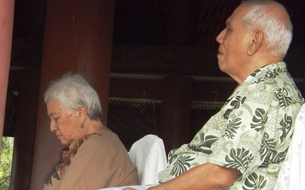 Head of State, Tui Atua Tupua Tamasese Efi (front) and his masiofo, Filifilia Tamasese at the reconciliation and welcoming back by the village of Lufilufi.