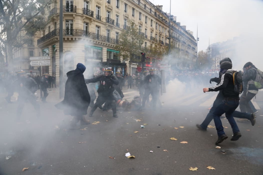 Police fired tear gas at demonstrators in Paris