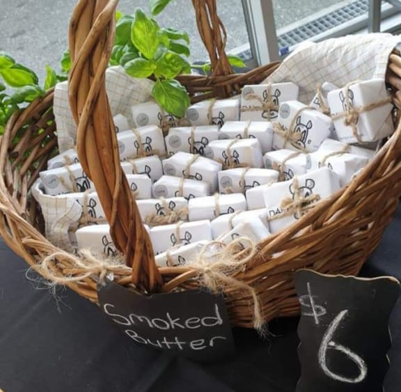 Charlie Pronk's Dairy Me smoked butter product in a basket, which he sells at farmers markets in west Auckland.