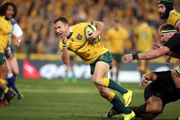 Nic White en route to the match-winning try against the All Blacks in Sydney