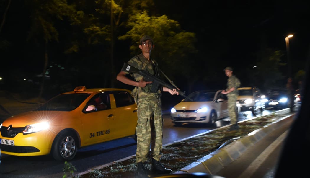 A Turkish security officer on guard in Istanbul during a security shutdown of the Bosphorus Bridge.