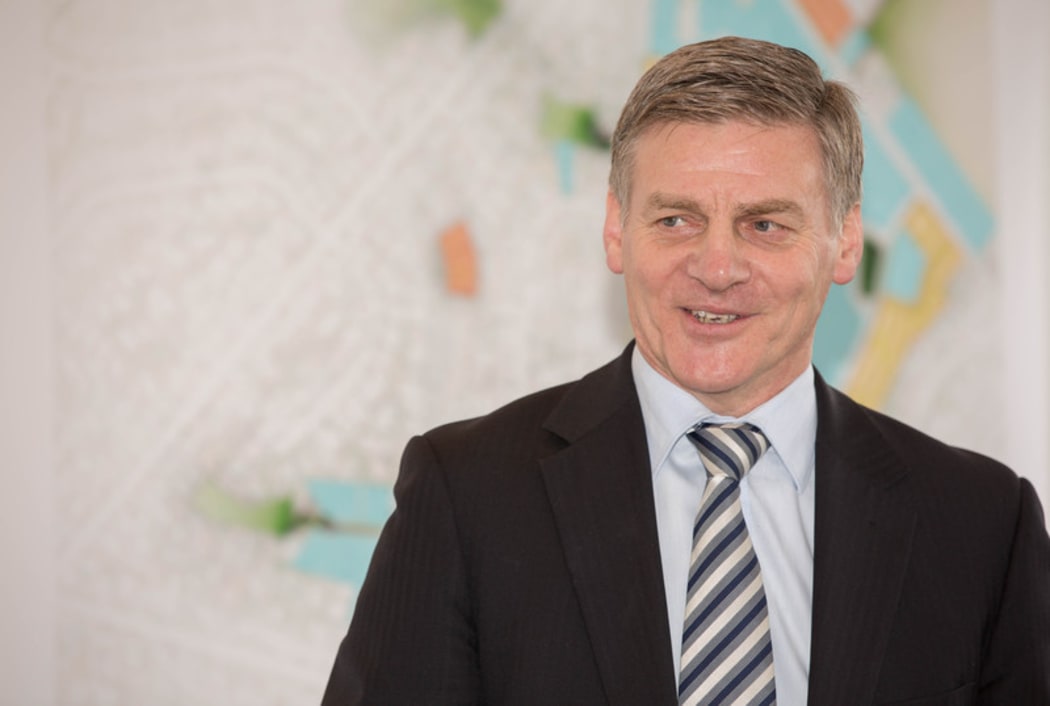 Bill English at a social housing announcement in Northcote