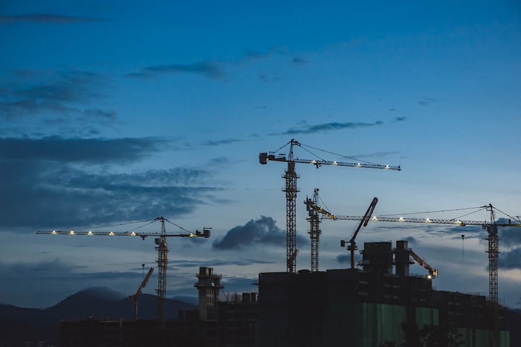 Construction, cranes above buildings, generic.