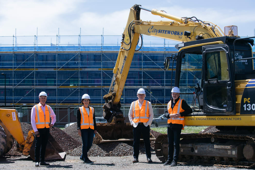 Simplicity Living directors (from left) Shane Brealey, Anna Brealey, Sam Stubbs, and Andrew Lance on site at the Hinaki Street development.