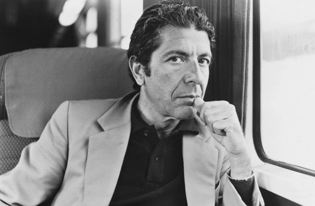Leonard Cohen black and white on a train