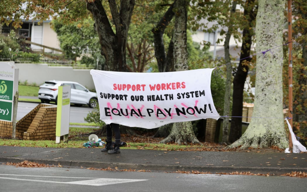 A protest against the controversial pay equity law change outside the Tāmaki  electorate  office of Workplace Relations and Safety Minister Brooke van Velden.