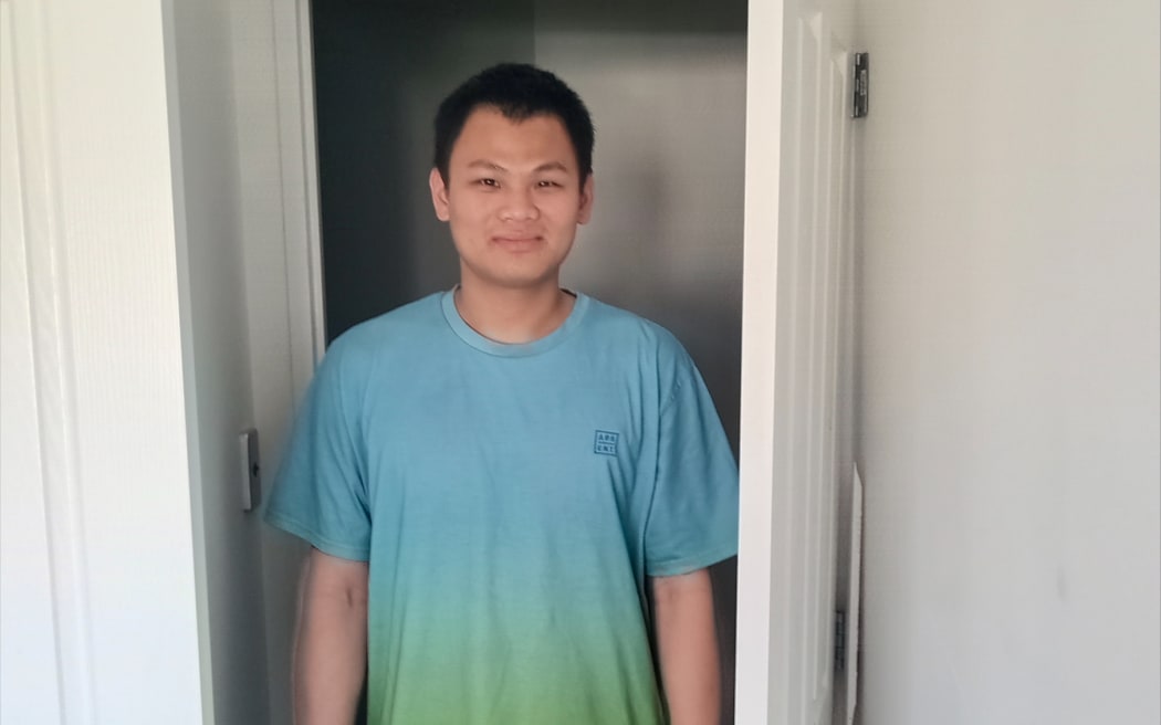 Flat Bush resident Binh Hoang says he was on the phone to police, as the robbers broke through his bedroom door.