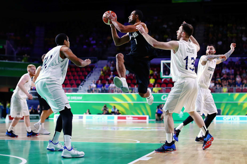Mika Vukona of New Zealand looks to make a pass.