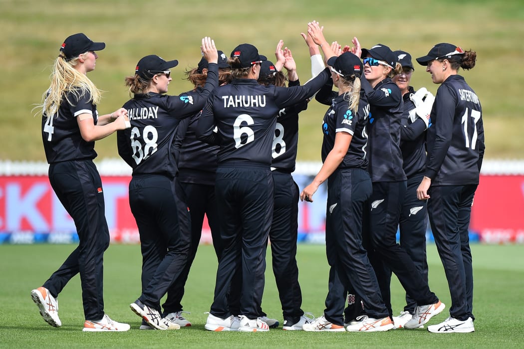 White Ferns celebrate an Indian wicket.