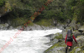 The swingbridge above the Whitcombe River near Hokitika.