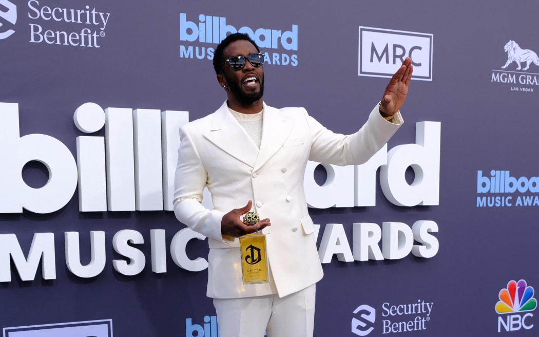 (FILES) US producer-musician Sean "Diddy" Combs attends the 2022 Billboard Music Awards at the MGM Grand Garden Arena in Las Vegas, Nevada, May 15, 2022. Combs will plead not guilty on September 17, 2024, to racketeering and sex trafficking charges, his lawyer said ahead of a court appearance by the superstar rapper. Combs, 54, was arrested on September 16 by federal agents acting on a sealed indictment filed by the US Attorney for the Southern District of New York. (Photo by Maria Alejandra CARDONA / AFP)