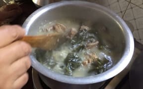 Hmepok is a porridge-like dish cooked with rice, meat and dried herbs.