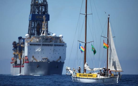 Anadarko's drill ship and a Greenpeace protest boat off Taranaki in November.