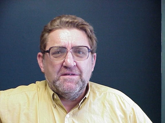 A portrait of economist Brian Easton.